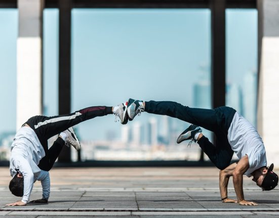 2 Olympic Break dancers in final pose